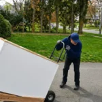 Professional Appliance Removal & Disposal Toronto hauling away old refrigerator by CNG Contracting.