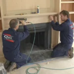 Professional Built-in Bookcases & Mantels Toronto installation with custom shelving by CNG Contracting.