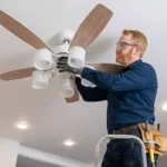 Professional Ceiling Fan & Light Fixture Installation Toronto mounting modern fan by CNG Contracting.