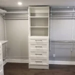 Professional Closet Organizer Installation Toronto assembling custom shelves by CNG Contracting.