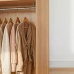 Professional Closet Rod Lowering Toronto installing heavy-duty support brackets by CNG Contracting.