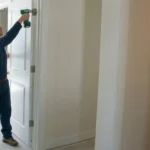 Professional Door Frame & Hinge Repair Toronto fixing sagging door by CNG Contracting.