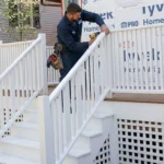 Professional Guard & Railing Installation Toronto securing aluminum deck railing by CNG Contracting.