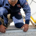 Professional Interior & Exterior Door Installation Toronto fitting new entry door by CNG Contracting.