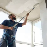 Professional Interior Wall & Ceiling Painting Toronto rolling fresh paint by CNG Contracting.