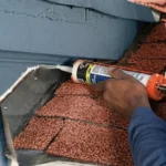 Professional Leak Sealing & Slope Adjustment Toronto fixing gutter pitch by CNG Contracting.