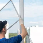 Professional Screen Repair & Installation Toronto replacing mesh on window frame by CNG Contracting.