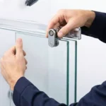 Professional Shower Door Adjustments Toronto fixing sagging glass hinge by CNG Contracting.