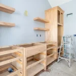 Professional Floating & Wall Shelf Installation Toronto leveling heavy duty brackets by CNG Contracting.