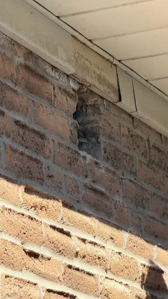 Opening in the brick wall for the range hood duct