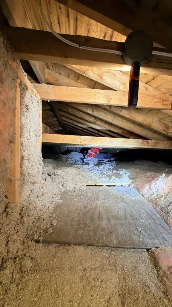 Attic of the Uxbridge home before running the range hood duct