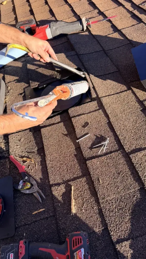 Sealing the roof vent flashing with roofing sealant