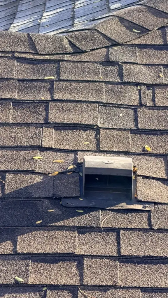 Range hood roof cap installed on the shingles