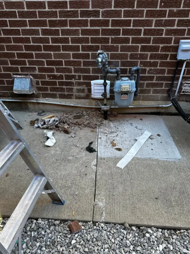 Exterior side of the house during the vent installation